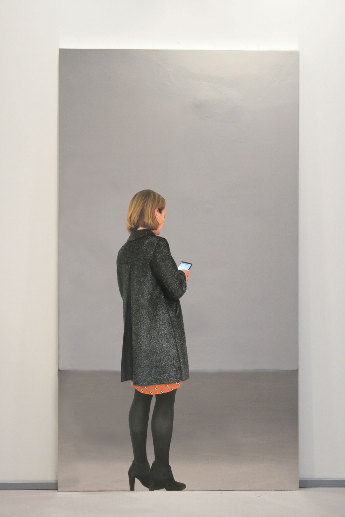 Michelangelo Pistoletto, Woman with coat and smartphone, 2018