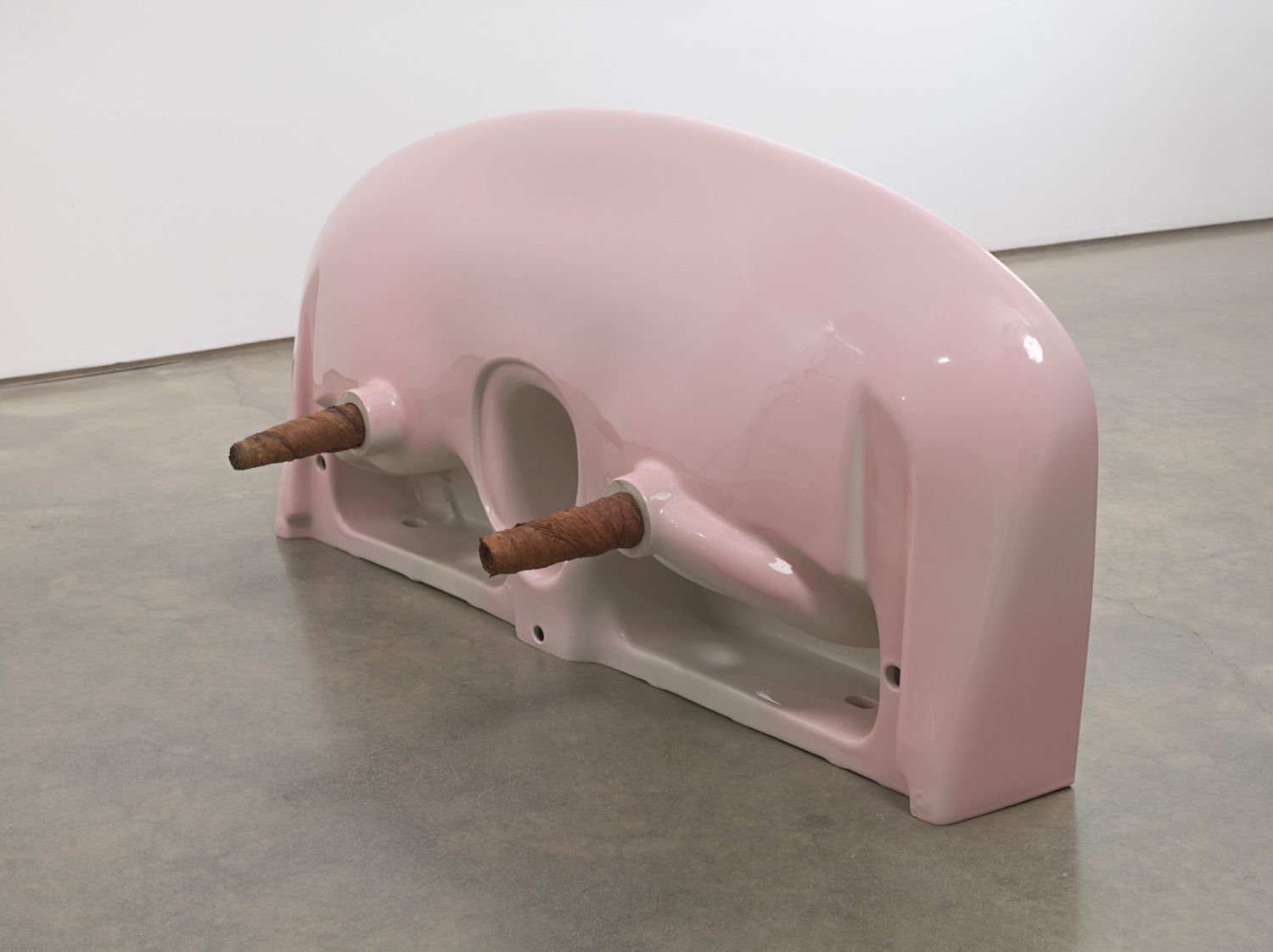 Plug, 2018. Ceramic sink, hand-rolled cigars,