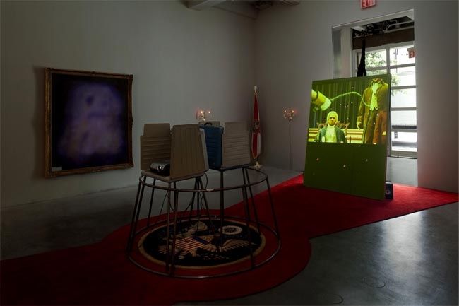 Stephen G Rhodes. Whipped Jamboree - Interregnum Repetition Restoration (Whipped Lincoln) and Interregnum Repetition Restoration (Whipped Washington), 2008. Unique dual channel video with voting booth and mixed media, dimensions variable. MP 5