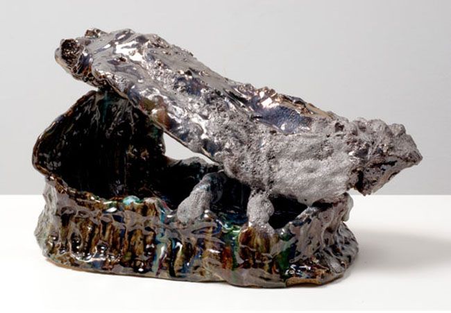 Head Artist / Archaeology 1, 2007. Ceramic, formica pedestal, sculpture: 12 x 13-1/2 inches (30.5 x 31.8 cm); pedestal: 48 x 26 x 22 inches (121.9 x 66 x 55.9 cm). MP 35