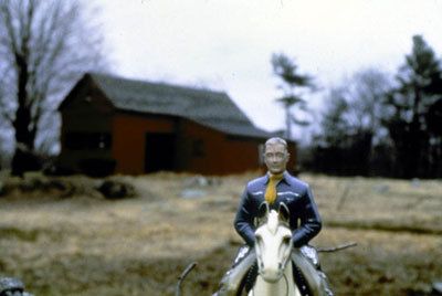 Laurie Simmons, Man/Blue Shirt/Red Barn, 1979