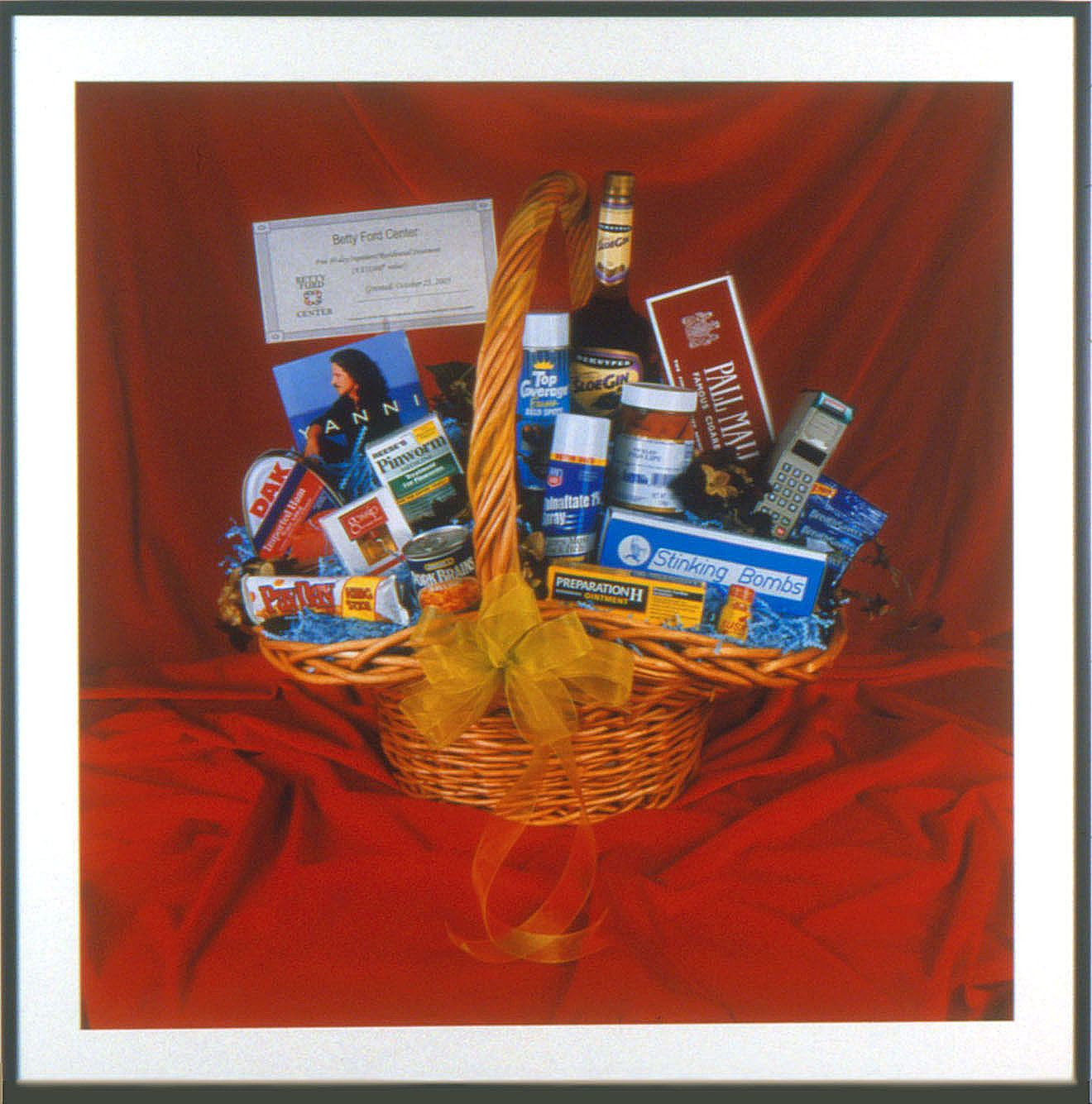 wicker basket with red curtain backdrop by john waters