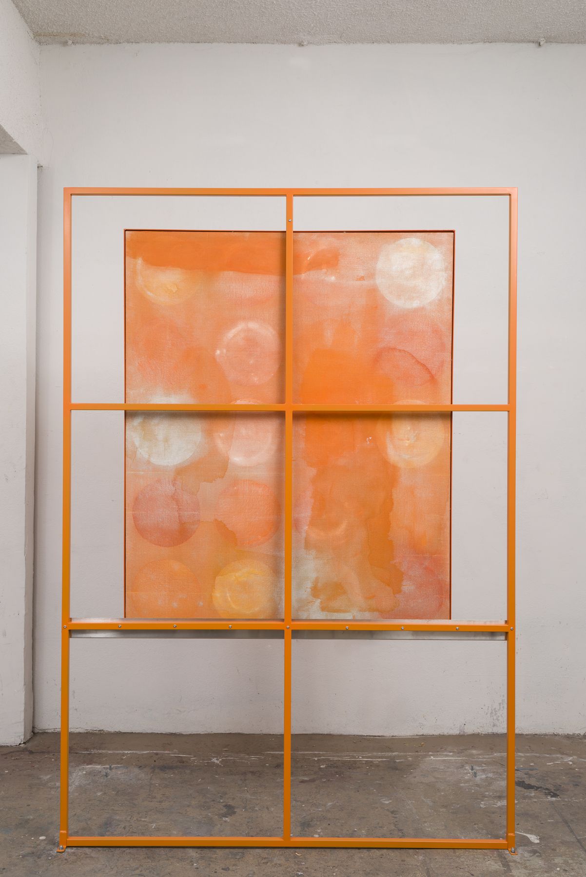an orange grid artwork that is two-sided by contemporary artist dashiell manley