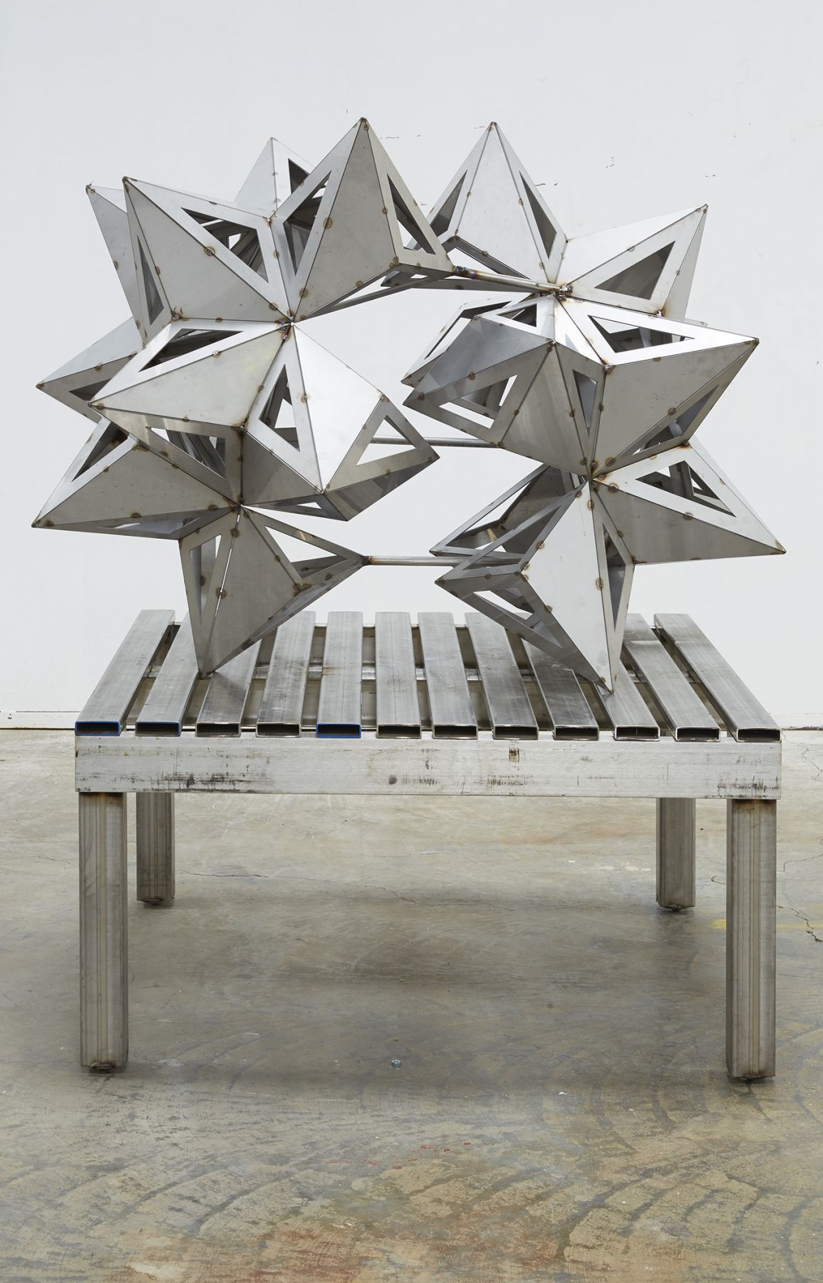 a stainless steel split star by frank stella available to buy