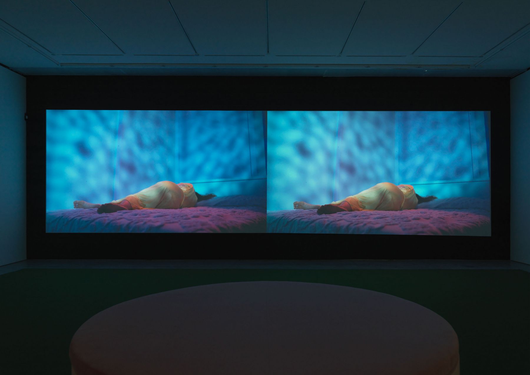 a two channel film by sue de beer showing in a new york art gallery
