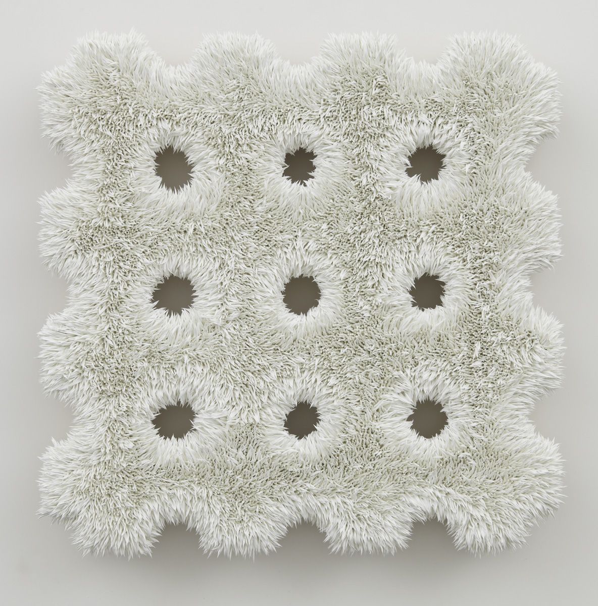 white glory hole painting by donald moffett in an exhibition in new york city