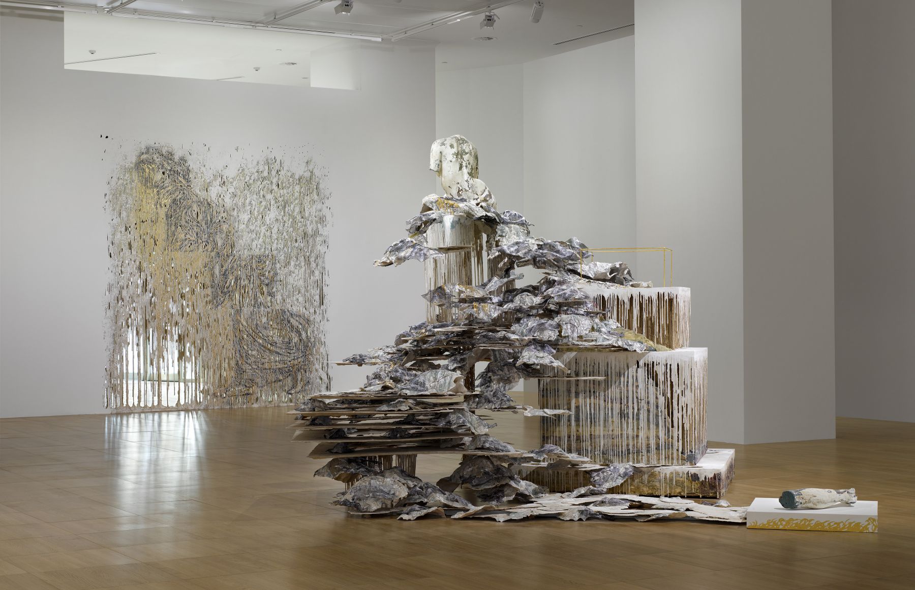 a view of a contemporary art gallery exhibiting the works of Diana Al-Hadid