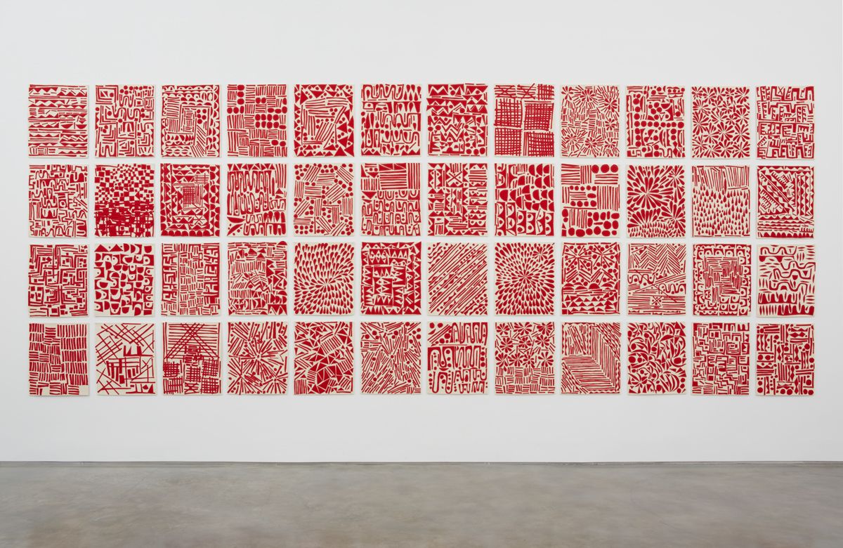 a grid series of red and white artworks by william j. o'brien for sale in a chelsea art gallery