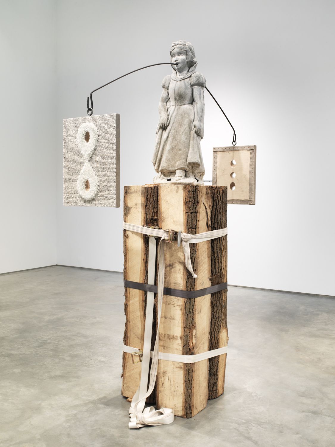 sculpture featuring snow white on a wood panel by donald moffett