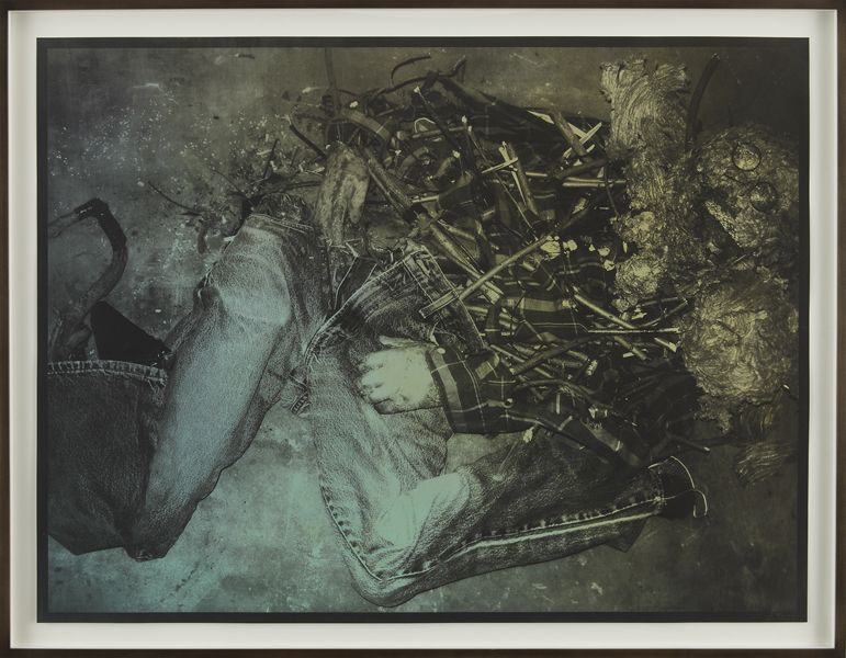 a print of a scarecrow like figure in black and white by jay heikes