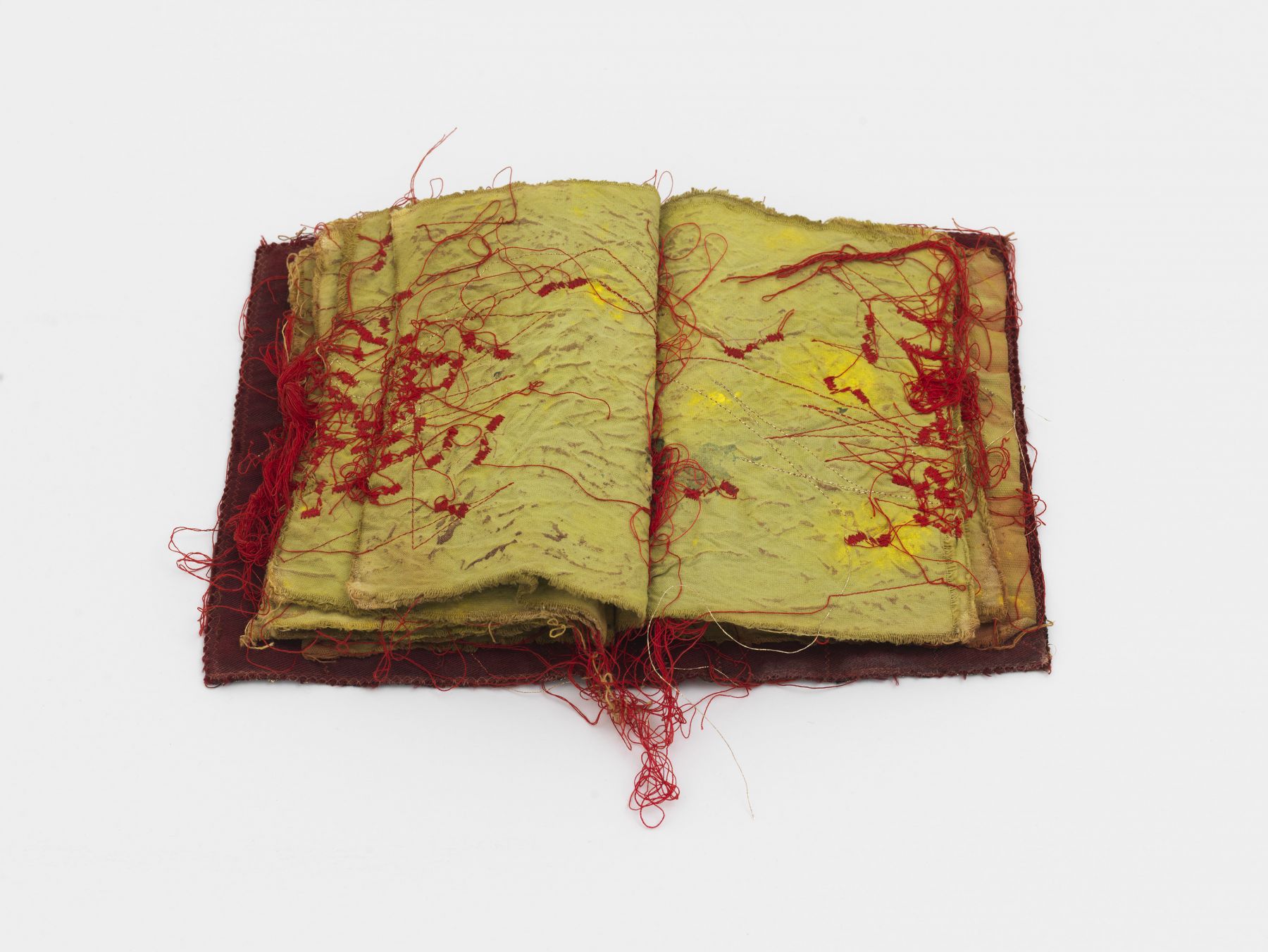 a fabric book by artist Maria Lai for sale at a new york city gallery