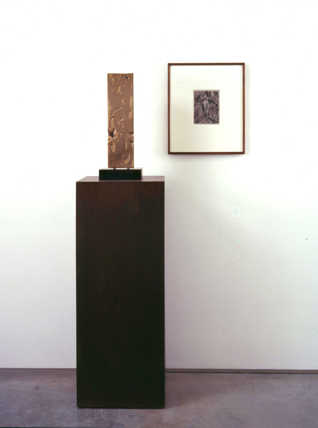 installation with photograph and rectangular sculpture by anthony pearson