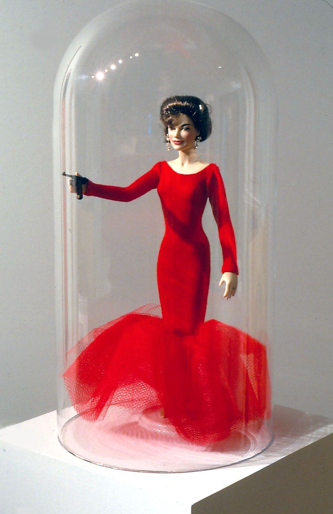 A Barbie doll by John Waters in a contemporary art gallery