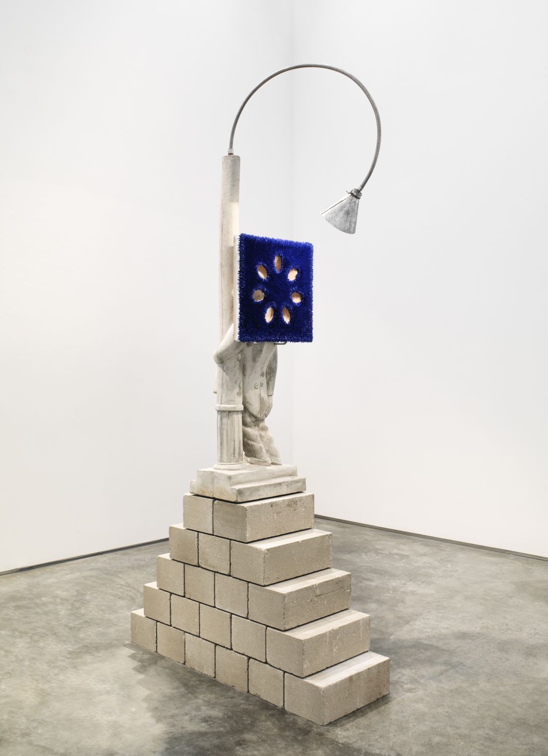 donald moffett's sculptural artworks featuring a painting on a lamp and concrete base