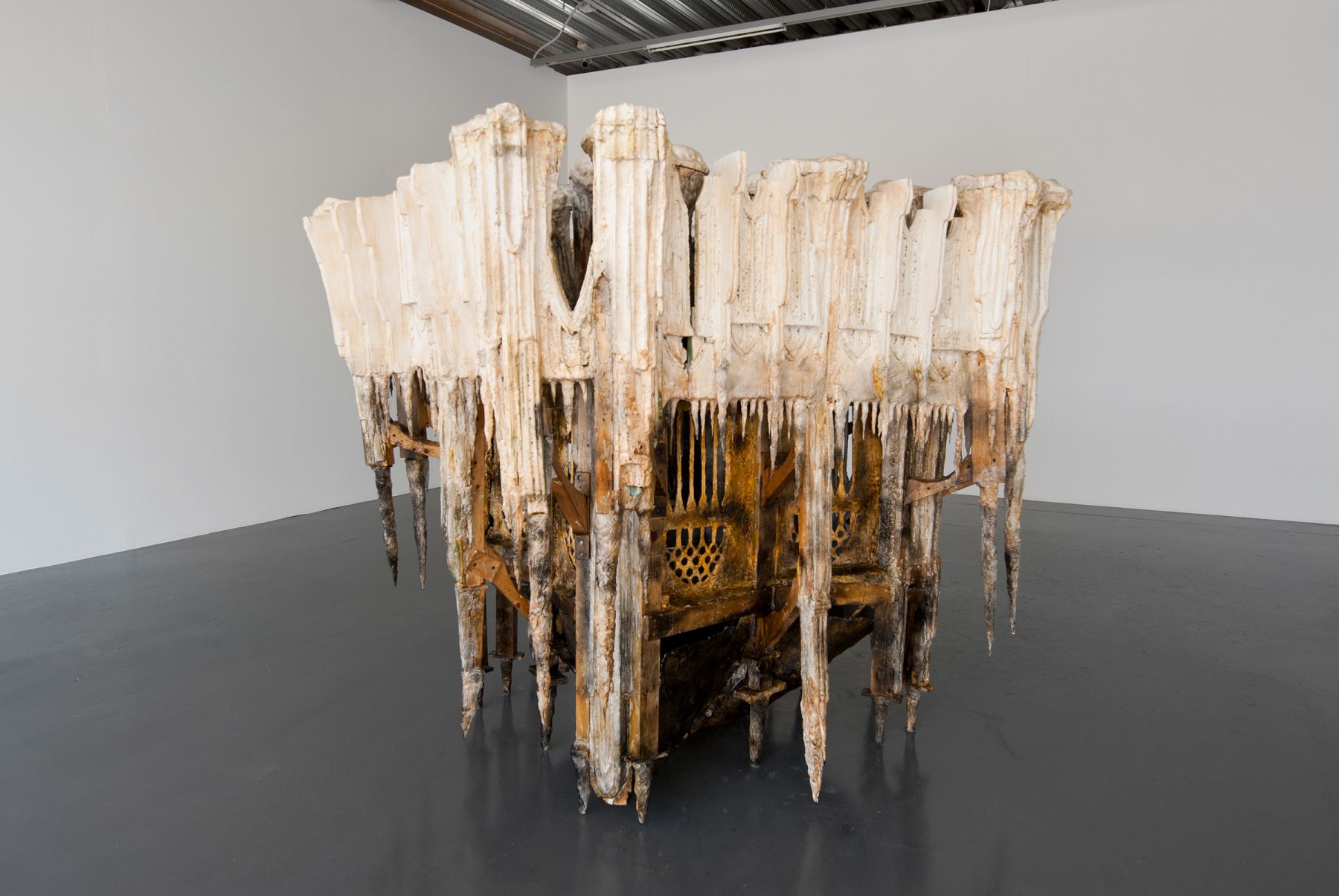 a sculpture by Diana Al-Hadid in a gallery on exhibition