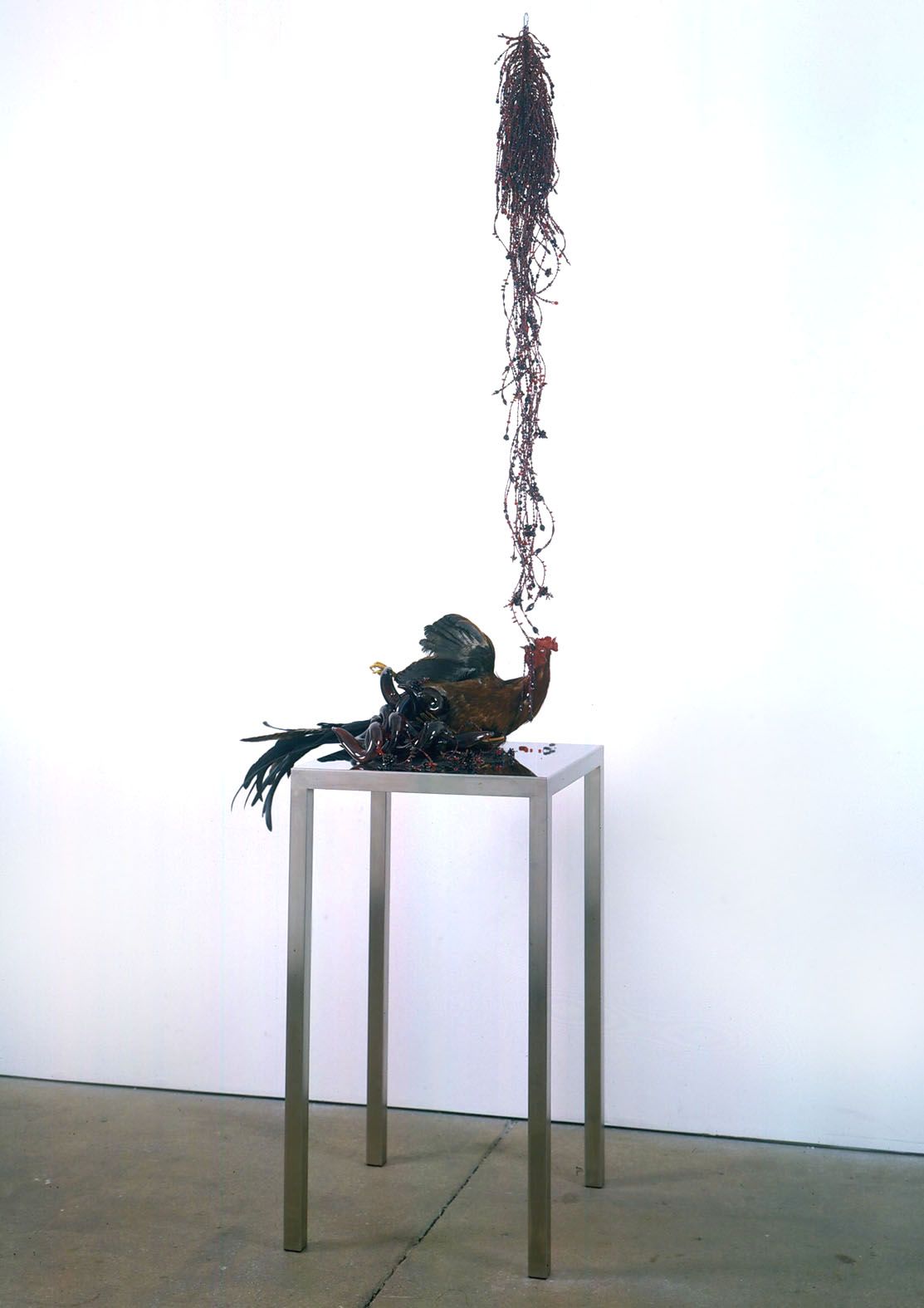table with rooster and insects by angelo filomeno