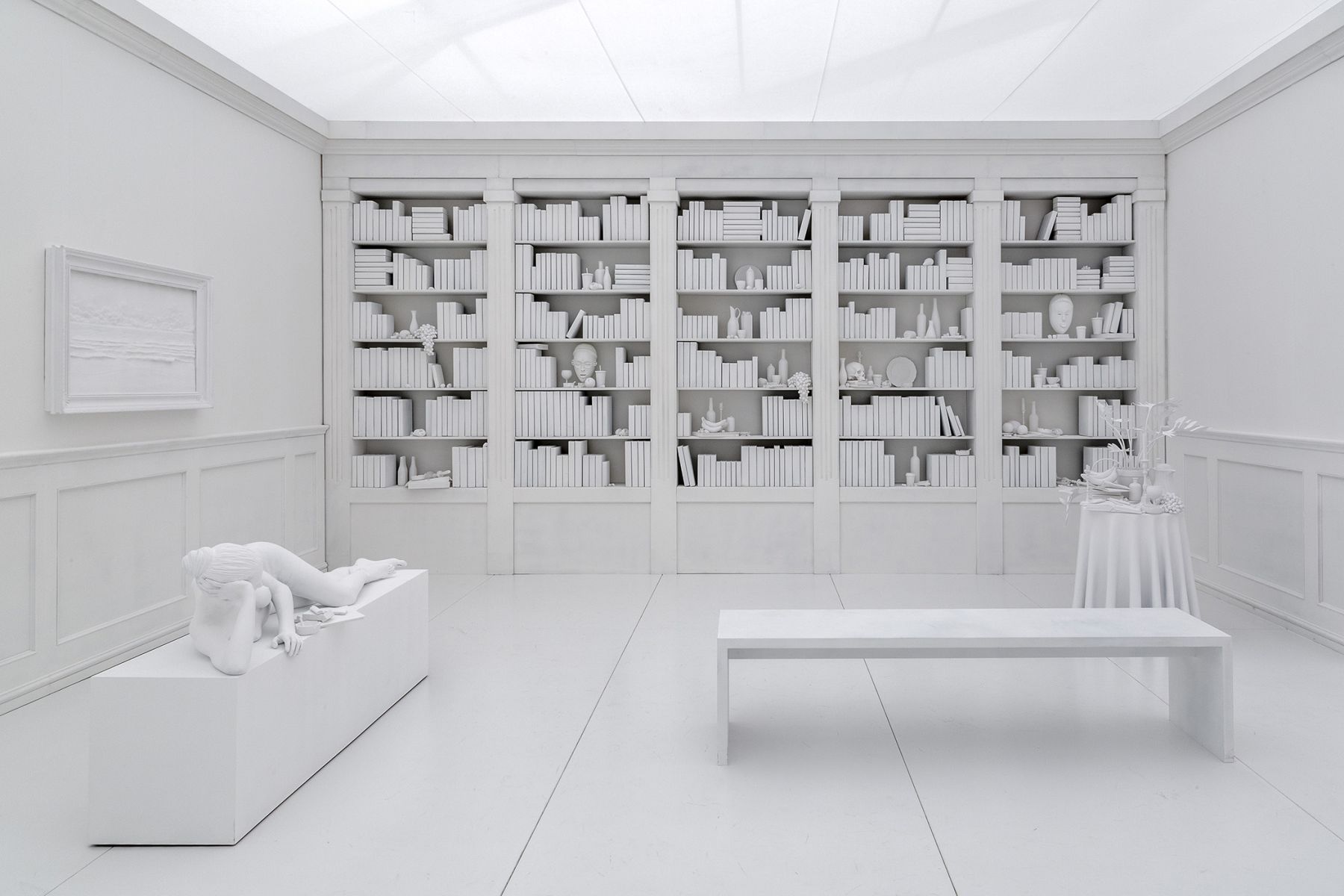 a library diorama by Hans Op de Beeck in an exhibition in an art gallery