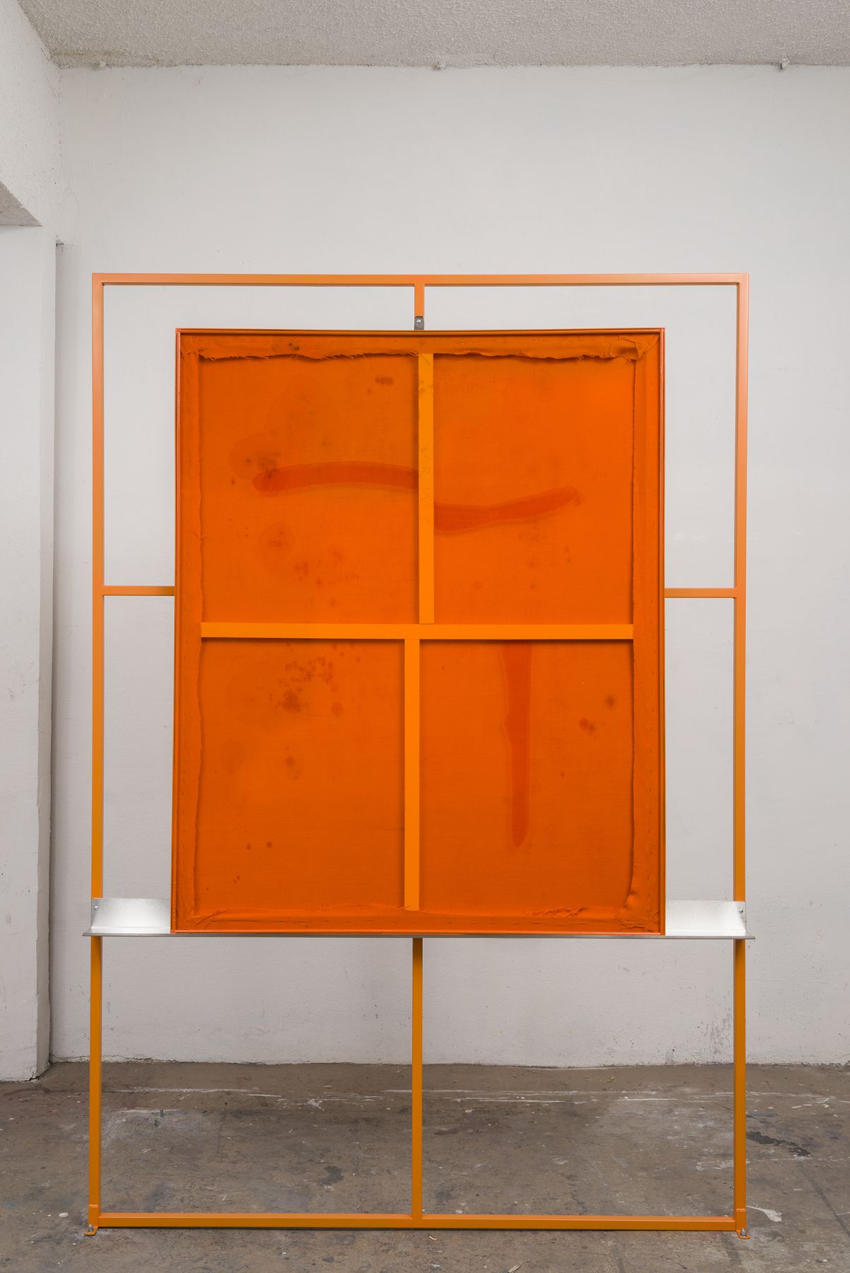 the other side of the sculptural artwork by dashiell manley in a bright orange