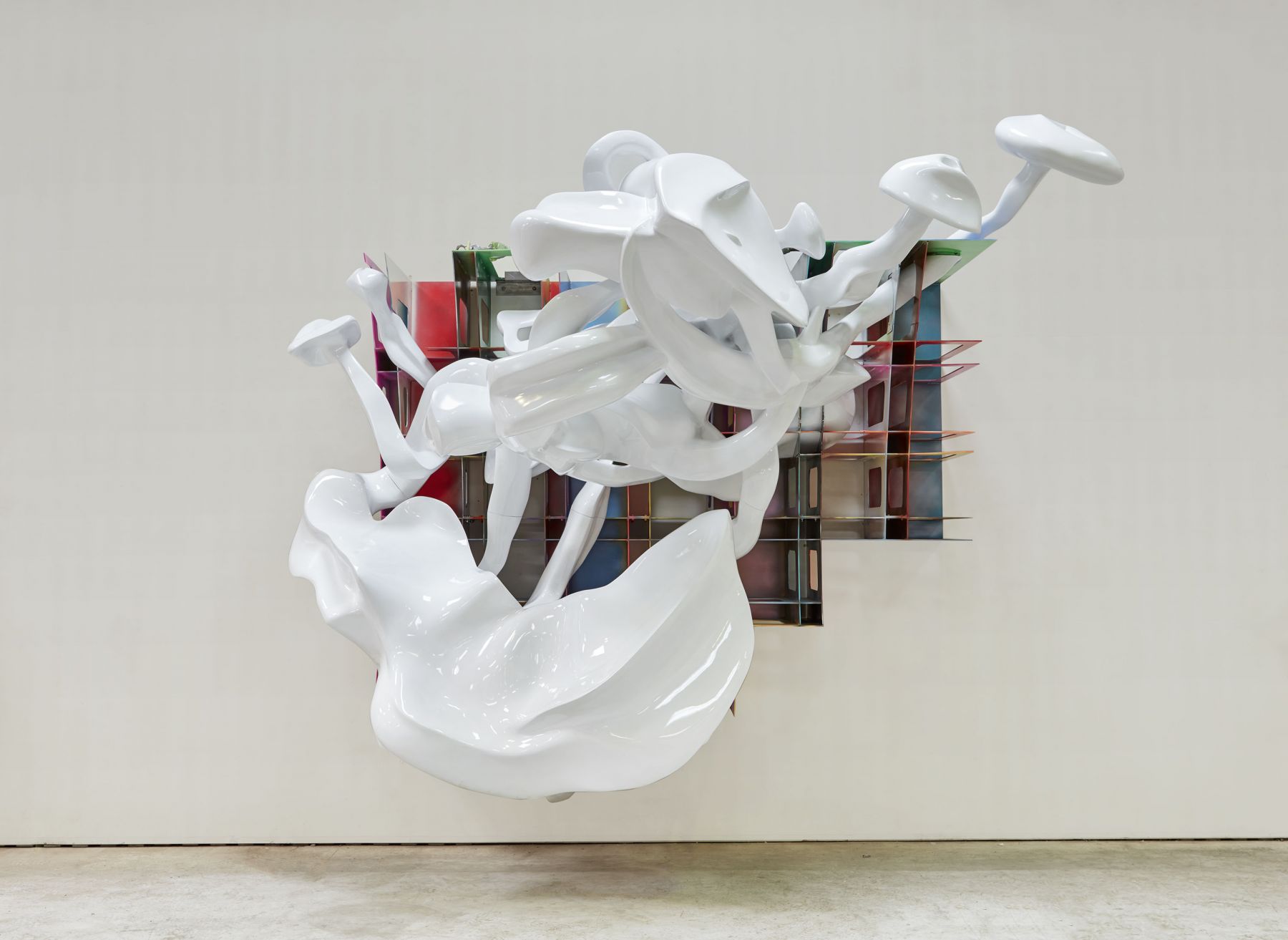 a large sculpture with smoke rings by frank stella