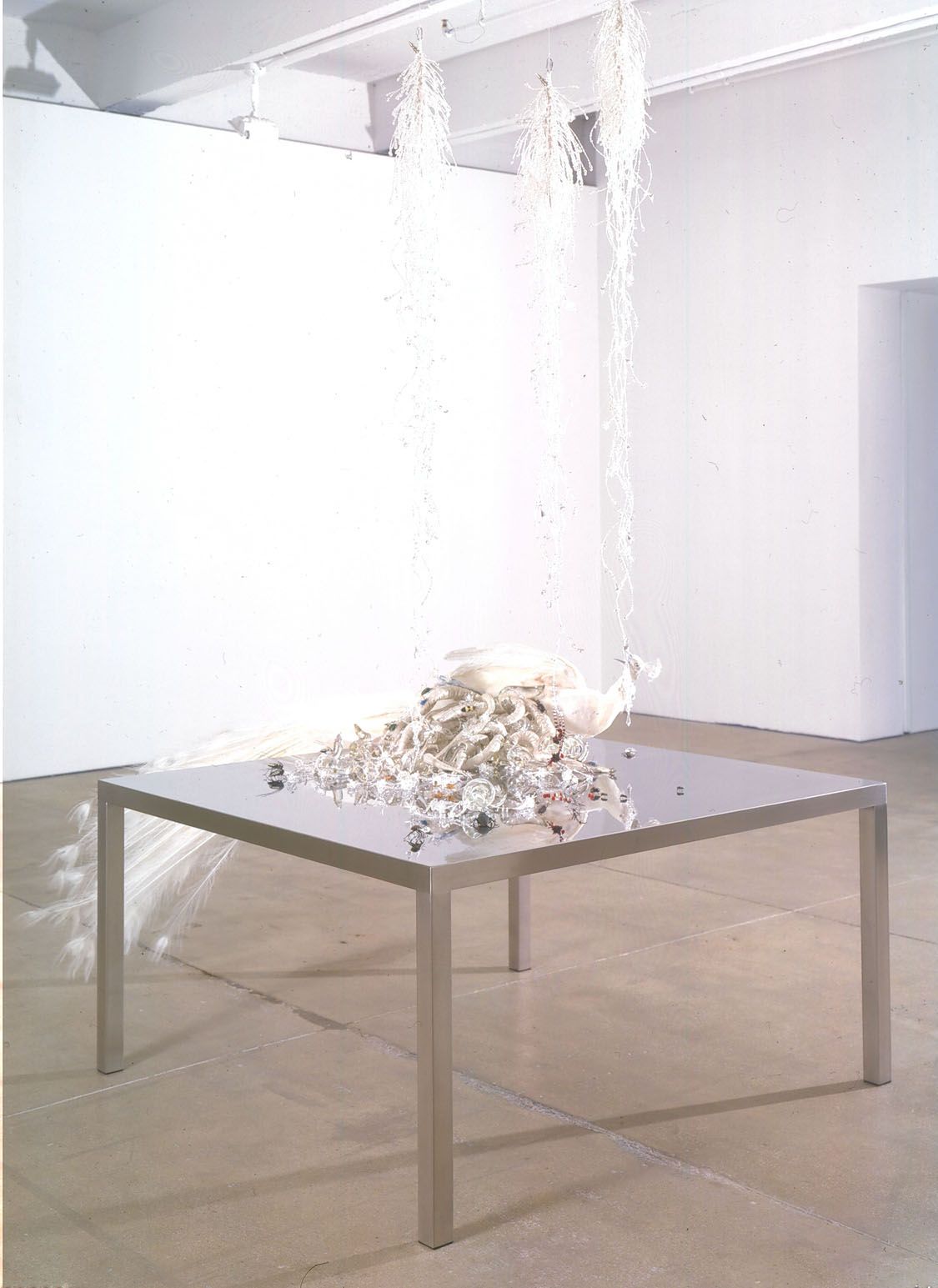 table with crystals and quartz by angelo filomeno