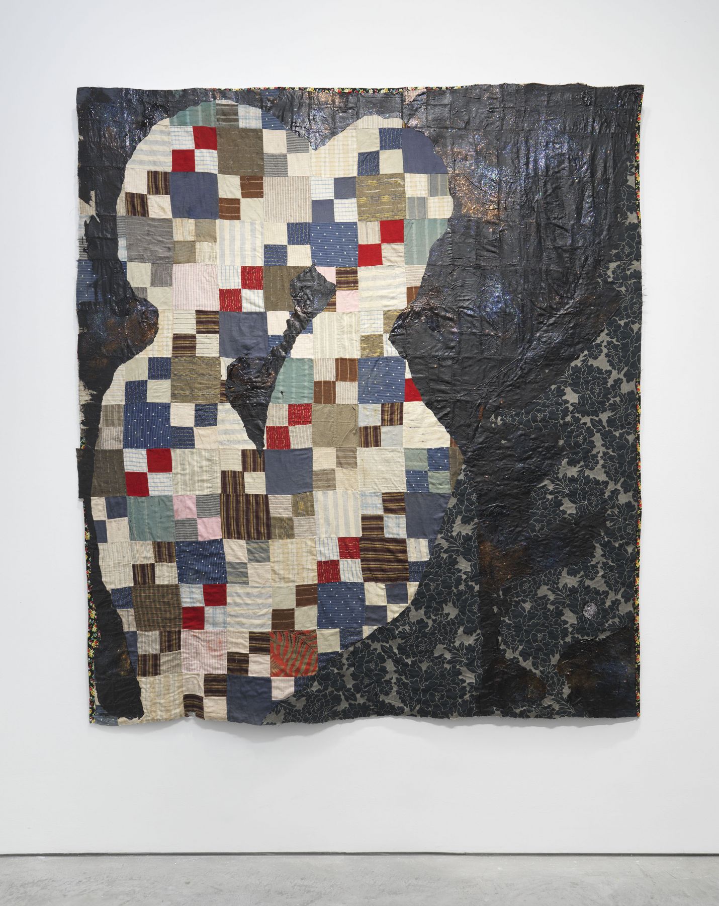 an antique quilt reworked as a work of contemporary art by Sanford Biggers