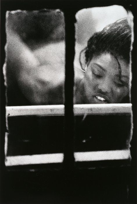 Woman in window by Merry Alpern