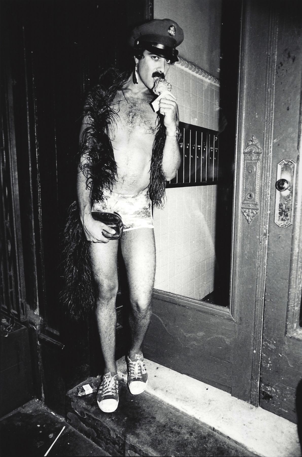 Man eating ice cream by Arlene Gottfried