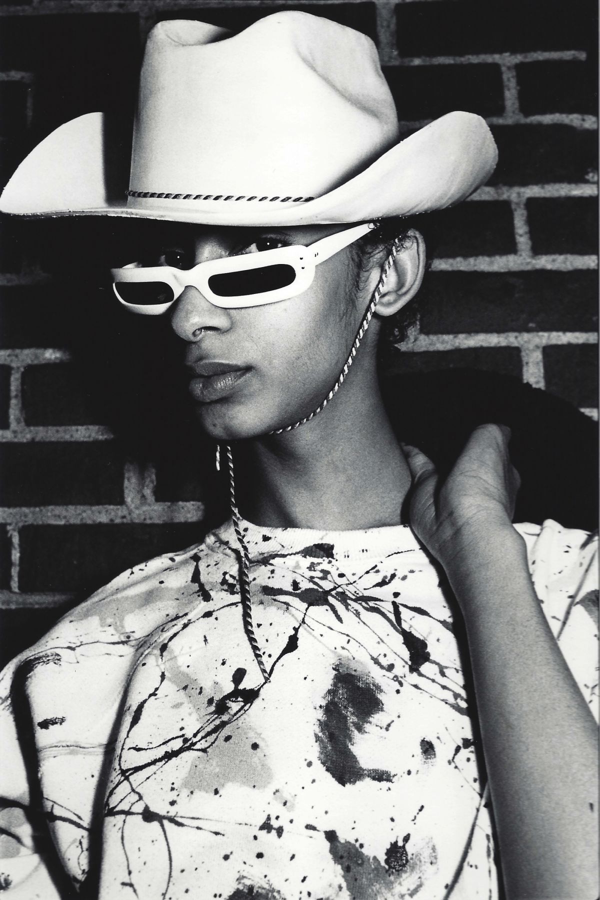 Man with cowboy hat by Arlene Gottfried