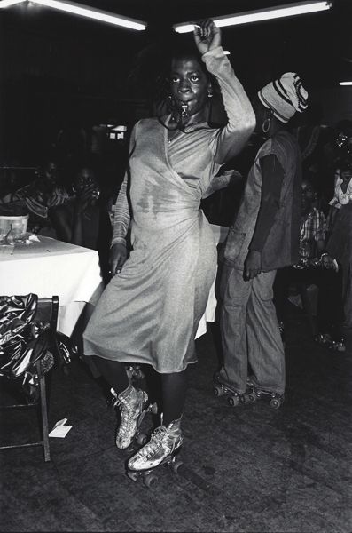 Woman on roller skates by Arlene Gottfried