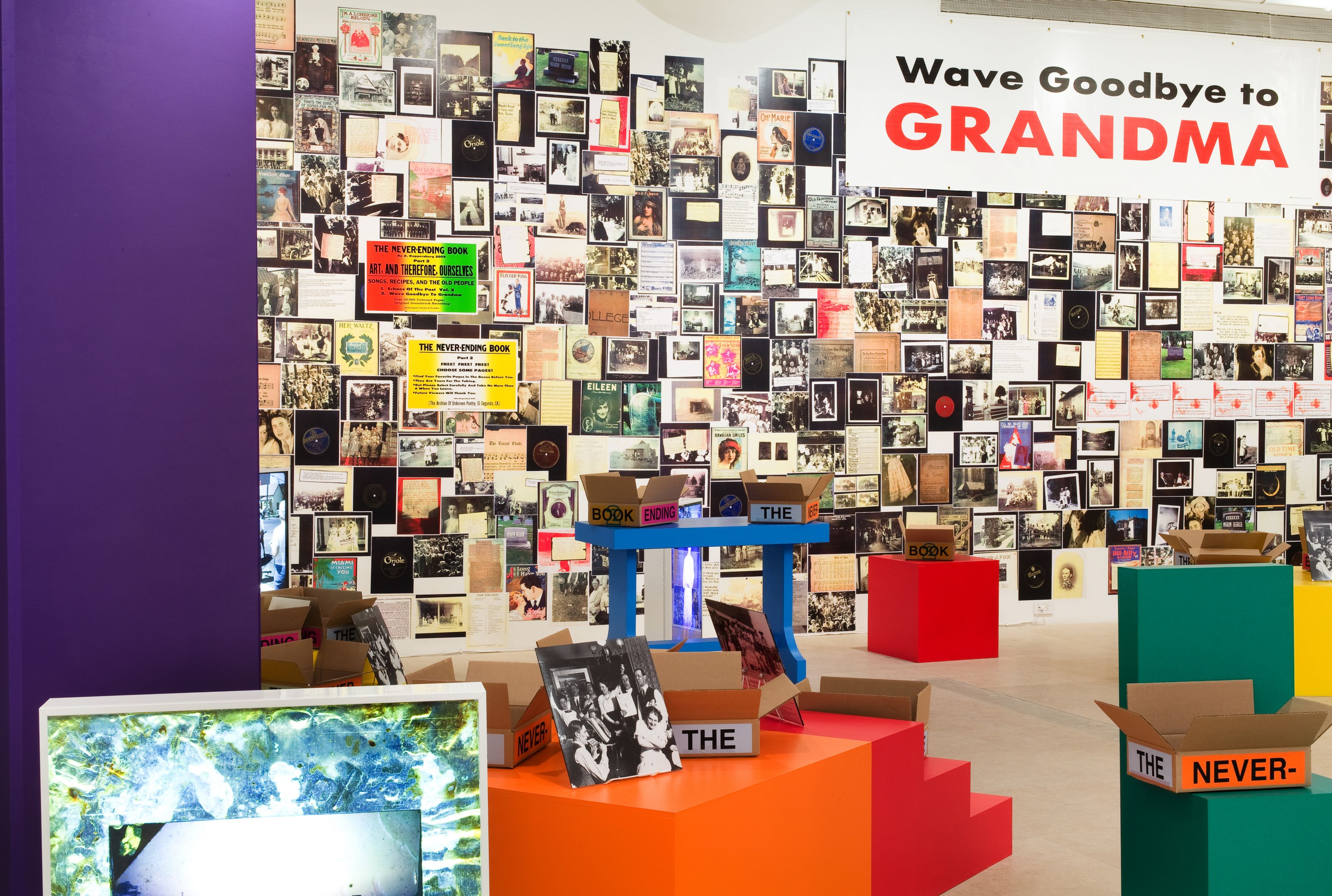 Allen Ruppersberg The Never Ending Book Part Two/Art and Therefore Ourselves, 2009 color copies, cardboard boxes, artist's records, 5 lightboxes, banner, letterpress posters, and 17 furniture elements overall dimensions variable