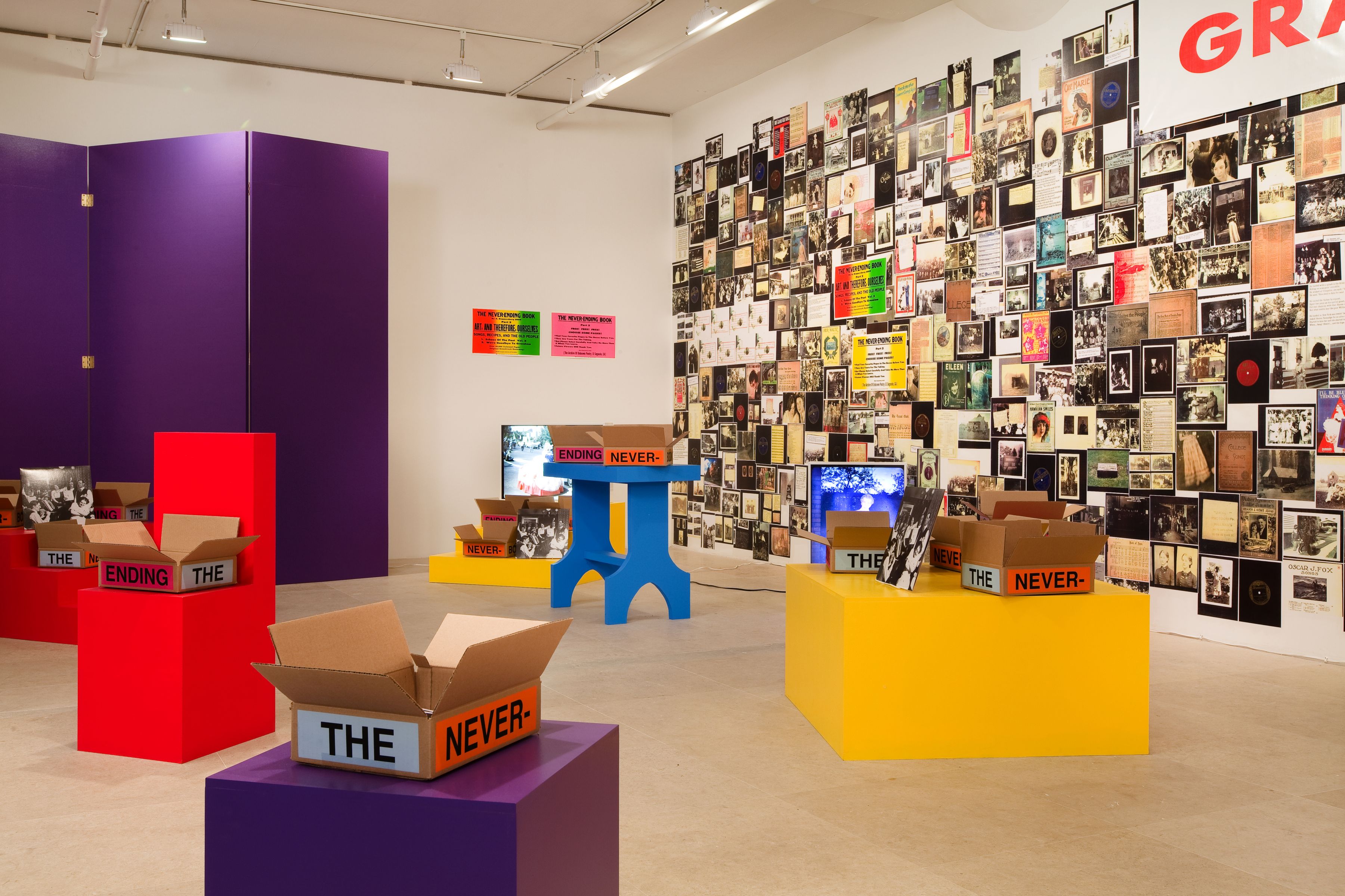 Allen Ruppersberg The Never Ending Book Part Two/Art and Therefore Ourselves 2009 color copies, cardboard boxes, artist's records 5 lightboxes banner letterpress posters and 17 furniture elements overall dimensions variable