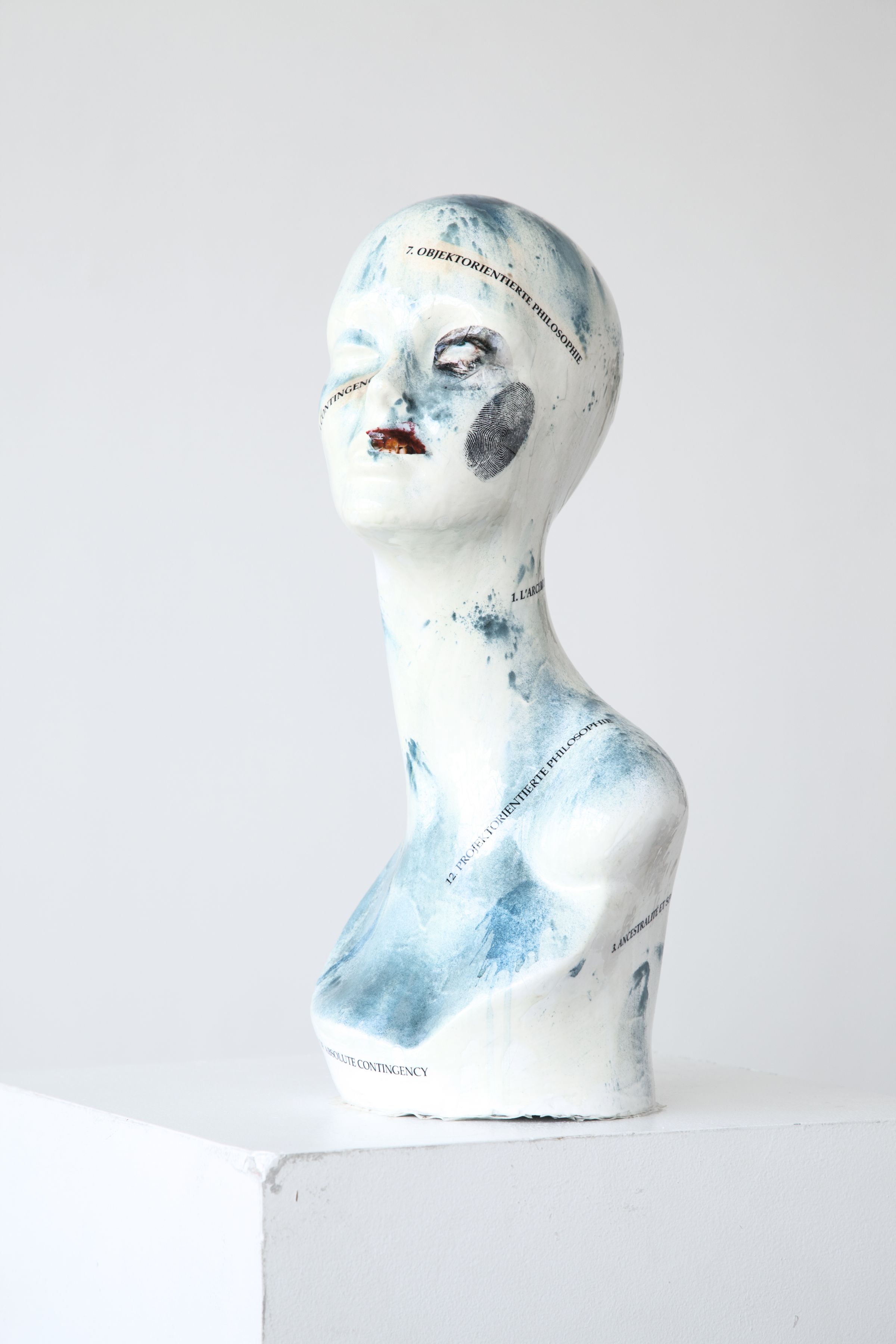 Mathieu Malouf Slave (Object-Oriented Philosophy), 2012 Decals, enamel, spirulina powder, epoxy resin on heads 19 x 8 1/2 x 8 1/4 inches (48.3 x 21.6 x 21 cm)