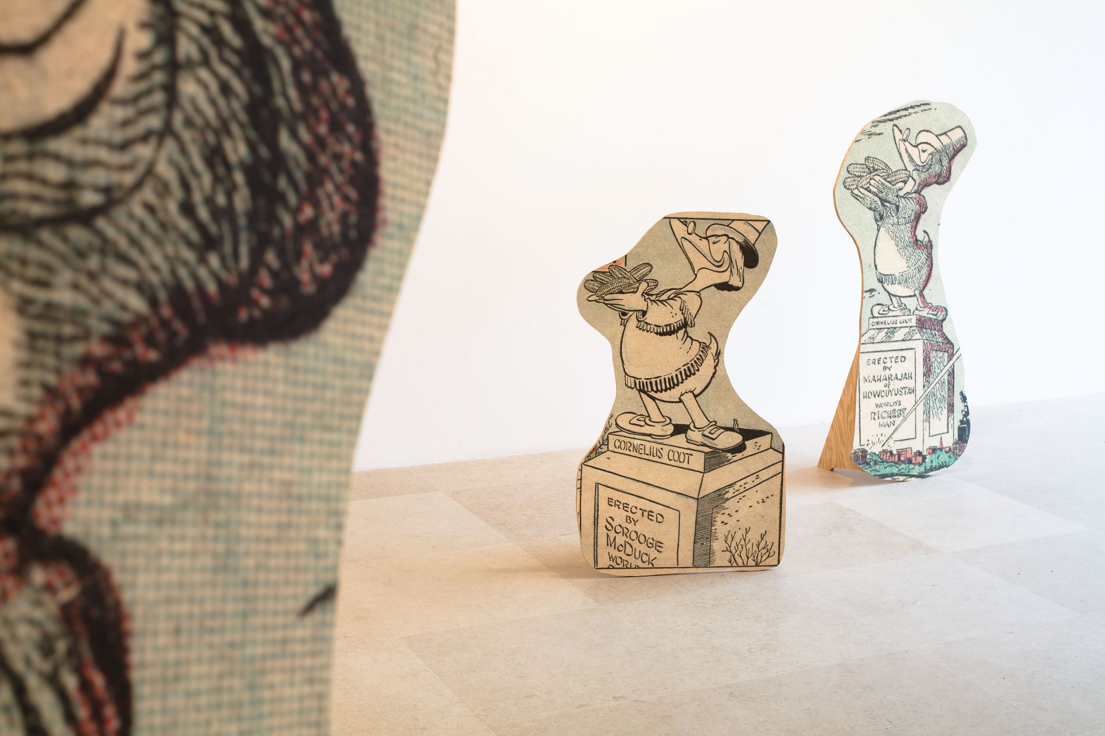 Allen Ruppersberg, Big Trouble, 2010, 10 framed pigment prints on paper with cutouts (each 30 5/8 x 22 inches) and 15 standing sculptures: pigment prints on paper mounted to AB marine-grade plywood, overall dimensions variable, Installation view, Greene Naftali, New York, 2010