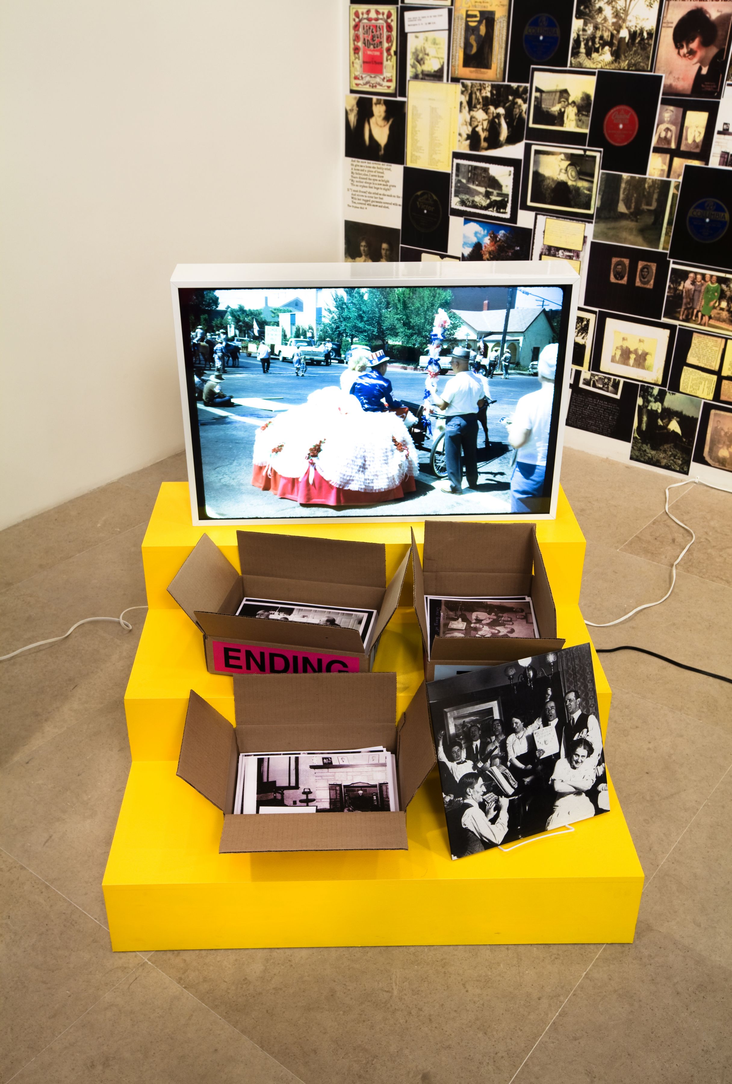 Allen Ruppersberg The Never Ending Book Part Two/Art and Therefore Ourselves 2009 color copies, cardboard boxes, artist's records 5 lightboxes banner letterpress posters and 17 furniture elements overall dimensions variable