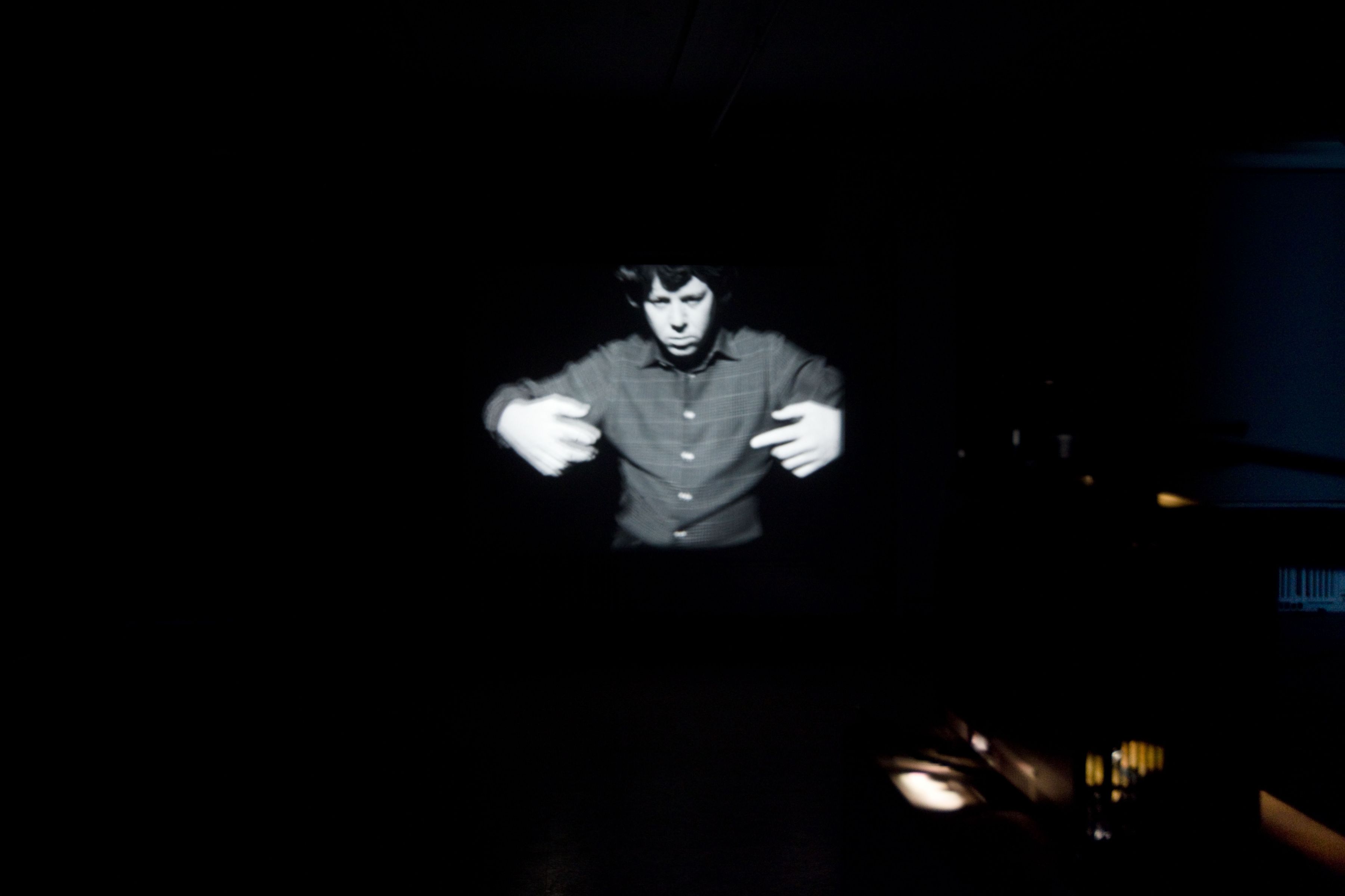 To navigate, in a genuine way, in the unknown necessitates an attitude of daring, but not one of recklessness (movements generated from the Magical Passes of Carlos Castaneda), 2009, 16mm black and white film, 3:30 minutes, continuous loop, Installation view, Greene Naftali, New York, 2010