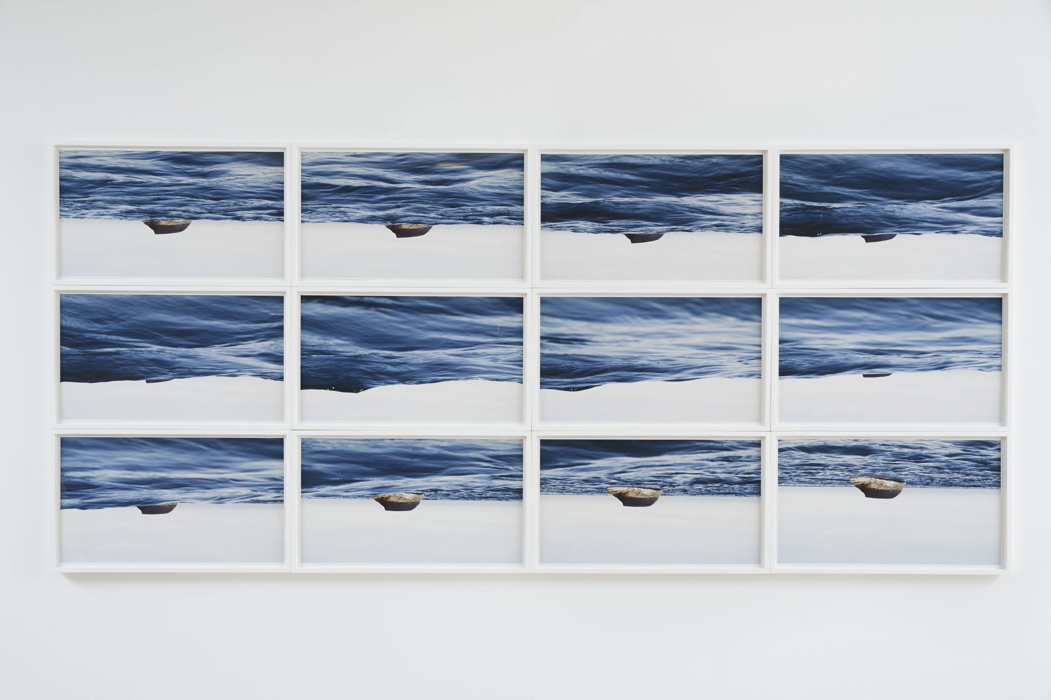 a series or a grid of photographs of a seascape by thiago rocha pitta