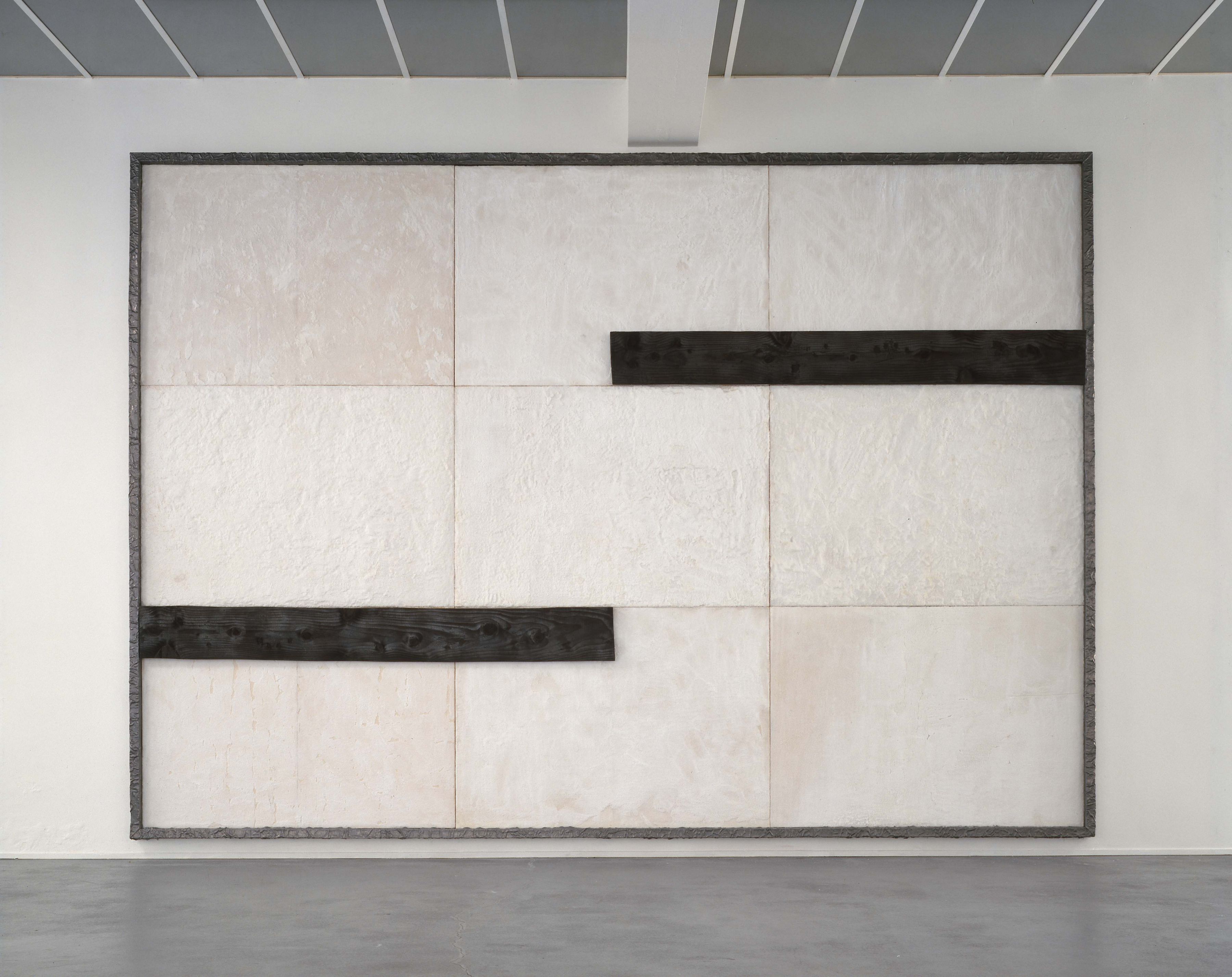 white and black grid painting made of wood, salt, and lead by pier paolo calzolari