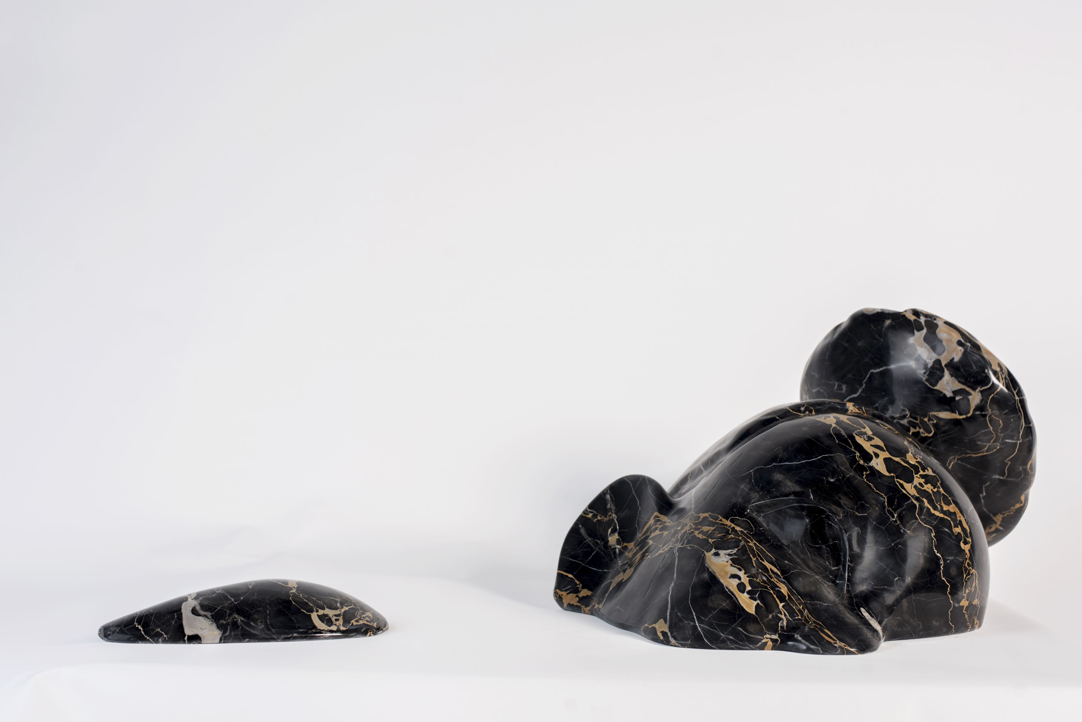 a marble sculpture by the artist Sanford Biggers