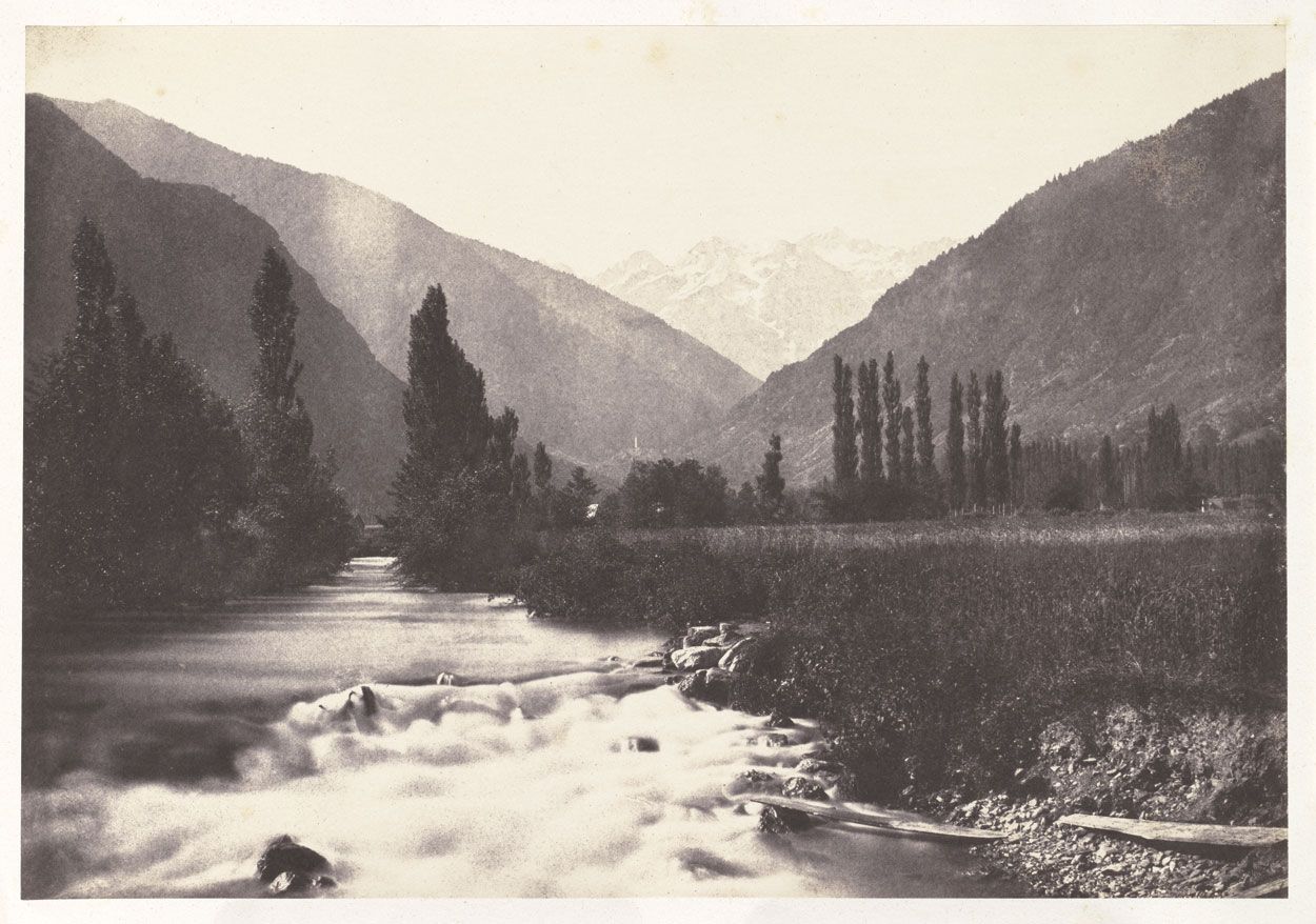 Joseph vicomte VIGIER (French, 1821-1894) "Bagnères de Luchon. La Vallée de Luchon prise de la promenade de la Pique. au 1er plan coule la Pique; au second à gauche est la montagne de Saint Mamet, Derrière celle de Guardera; à droite, Derrière la tour de Castelvieih, la forêt du même nom : au dernier plan les glaciers de Vénasque.", 1853 Salt print from a paper negative 24.8 x 36.0 cm