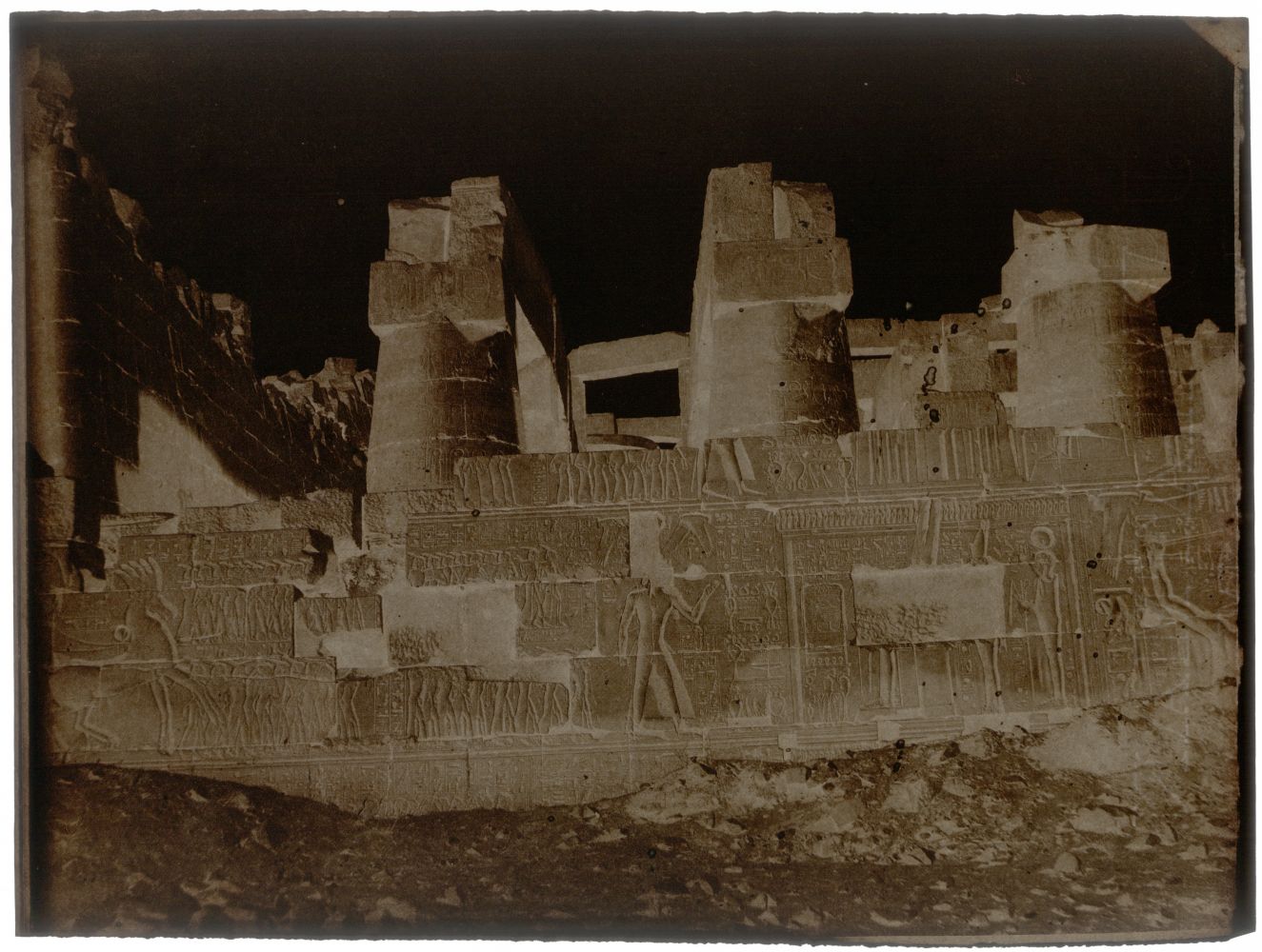 John Beasley GREENE (American, born in France, 1832-1856) Great Hypostyle Hall, outer face, north wall, Karnak, 1854-1855 Waxed paper negative 24.0 x 31.8 cm Watermark "J Whatman"