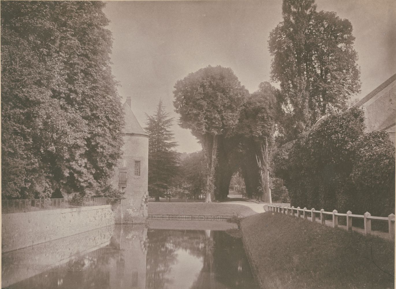 Joseph vicomte VIGIER (French, 1821-1894) Chateau de Grand-Vaux, Savigny sur Orge, the family home of Vigier, circa 1855 Coated salt or albumen print from a paper negative 17.3 x 23.5 cm mounted on 20.6 x 29.2 cm album page