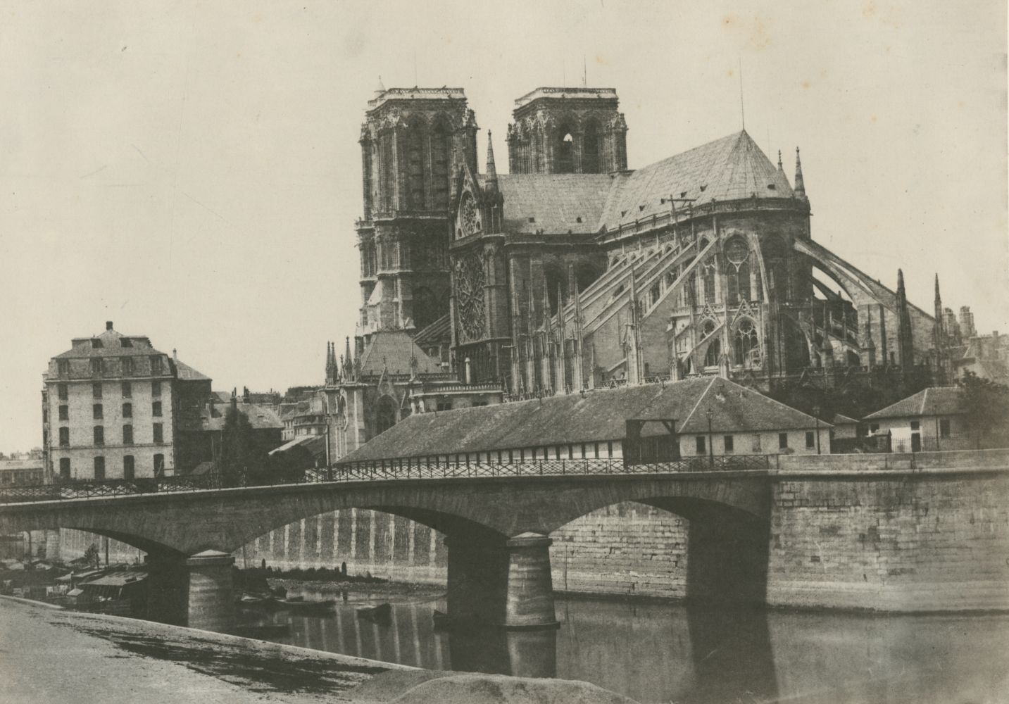 Attributed to Henri LE SECQ (French, 1818-1882) "Église Métropolitaine de Notre-Dame XIIe Siècle", circa 1852 Blanquart-Evrard process salt print from a paper negative 22.4 x 31.9 cm mounted on 39.0 x 50.0 cm paper Title with "Paris Photographique / Blanquart Evrard, Editeur / Imprimerie Photographique Blanquart Evrard á Lille" printed on mount