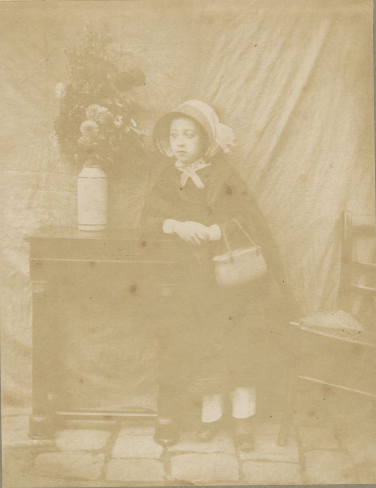 Hippolyte Bayard (French, 1801-1887) Petite fille au bouquet, mid 1840s Salt print from a paper negative 16.6 x 12.8 cm, hinged onto gray paper
