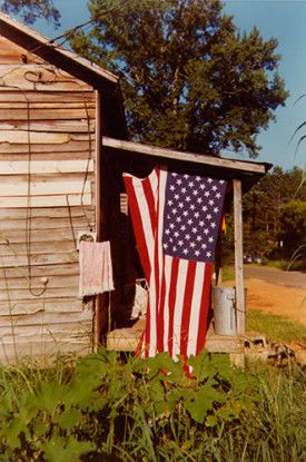 House with Flag, Greensboro, Alabama, 1977