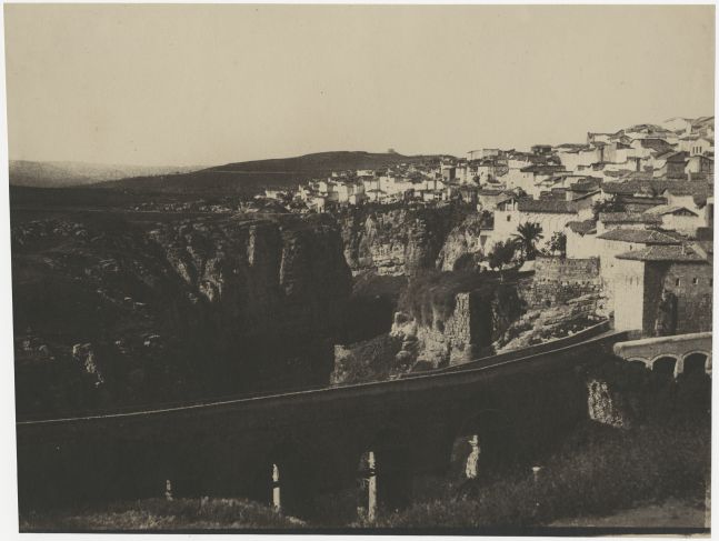 John Beasley GREENE (American, born in France, 1832-1856) El-Kantara Bridge, Constantine, Algeria*, 1855-1856 Lightly coated salt print from a paper negative 22.5 x 30.3 cm on 22.8 x 30.3 cm paper Inscribed "Constantine" in pencil on verso