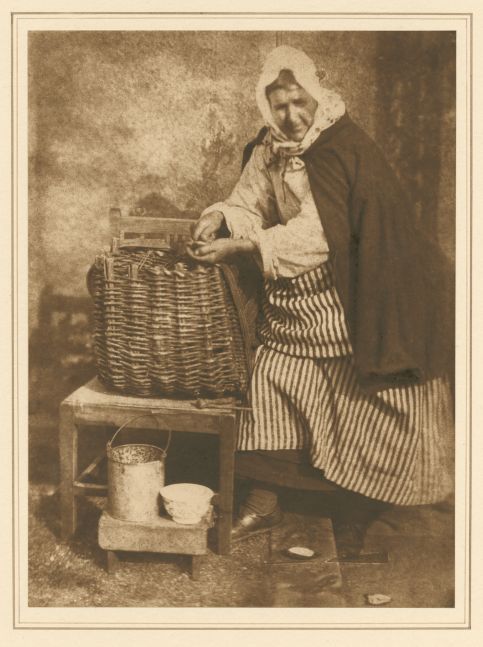 David Octavius HILL & Robert ADAMSON (Scottish, 1802-1870 & 1821-1848) Mrs. Barbara (Johnstone) Flucker, Newhaven Carbon print by Jessie Bertram, 1916, derived from the original calotype negative by Hill and Adamson, 1843-1847 20.4 x 15.2 cm mounted on 38.3 x 26.5 cm paper