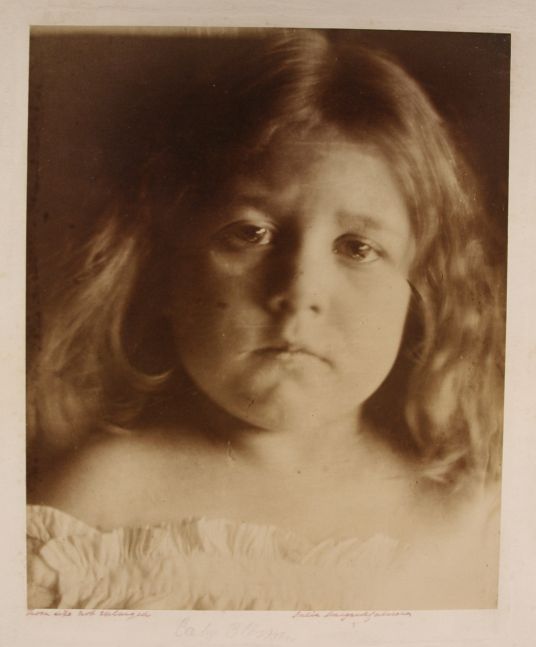 Julia Margaret CAMERON (English, born in India, 1815-1879) "Baby Blossom" Alice Keown, circa 1866 Albumen print from a wet collodion negative 34.1 x 27.8 cm mounted on 52.3 x 45.4 cm card Signed, inscribed "From life not enlarged" in ink, titled in an unknown hand in pencil, with Colnaghi blindstamp on moun