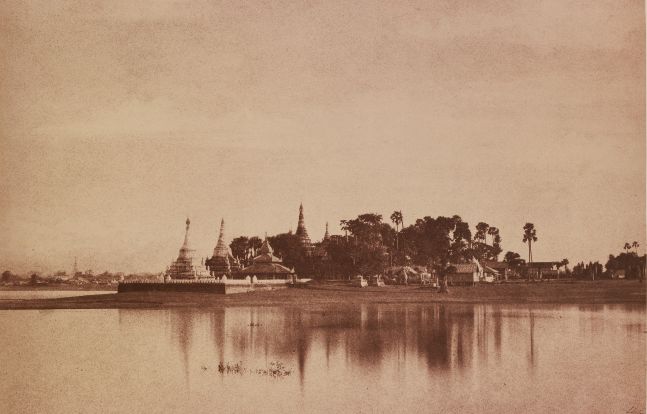 Captain Linnaeus TRIPE (English, 1822-1902) "No. 56. Amerapoora. View on the Lake.", September-October 1855 Albumenized salt print from a waxed paper negative 22.4 x 34.8 cm mounted on 45.6 x 58.3 cm paper Signed "L. Tripe" in ink. Photographer's blindstamp and printed label with plate number, title and "Taken from the causeway crossing the Toung-deman lake at its Eastern extremity. A glimpse of the city is caught on the left." on mount.