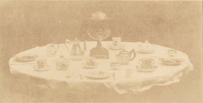 William Henry Fox TALBOT (English, 1800-1877) Table set for tea, 1841-1842 Varnished salt print from a calotype negative 8.5 x 16.8 cm mounted on card, ruled "Patent Talbotype Photogenic Drawing" label on mount verso