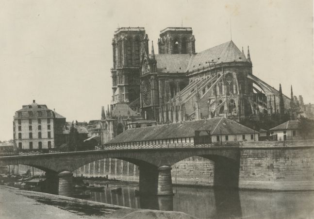Attributed to Henri LE SECQ (French, 1818-1882) "Église Métropolitaine de Notre-Dame XIIe Siècle", circa 1852 Blanquart-Evrard process salt print from a paper negative 22.4 x 31.9 cm mounted on 39.0 x 50.0 cm paper Title with "Paris Photographique / Blanquart Evrard, Editeur / Imprimerie Photographique Blanquart Evrard á Lille" printed on mount